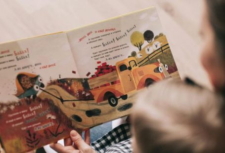 Storytelling - Woman Reading Book to Toddler