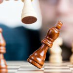 Personalization Tactics - Man Holding Chess Piece