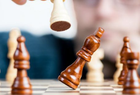 Personalization Tactics - Man Holding Chess Piece