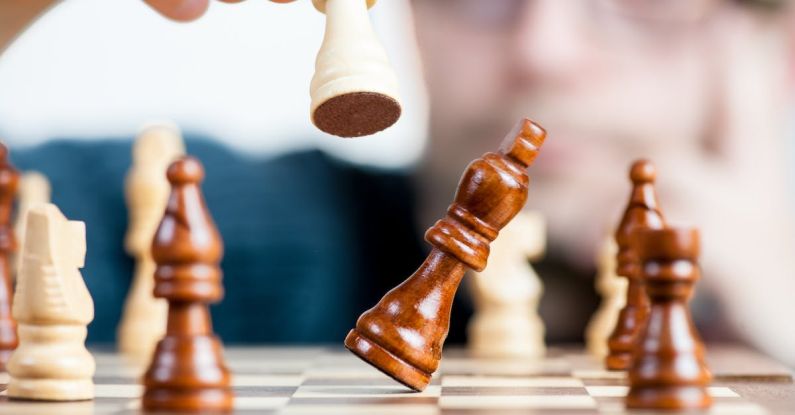 Personalization Tactics - Man Holding Chess Piece