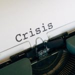 Crisis Management Plan - White Paper On A Vintage Typewriter