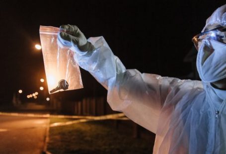 Key Metrics - Person in White Long Sleeve Shirt Holding Clear Drinking Glass