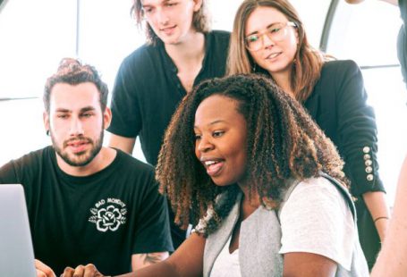 Influencer Marketing - Woman Sharing Her Presentation with her Colleagues