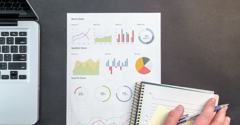 Data Analysis - Person Holding Blue Ballpoint Pen on White Notebook