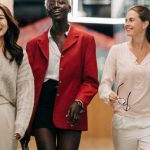 Workspace Organization - Successful multiethnic business colleagues in modern office