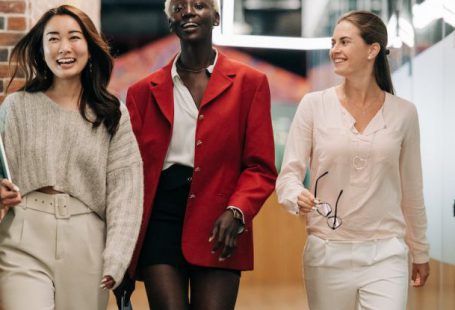 Workspace Organization - Successful multiethnic business colleagues in modern office