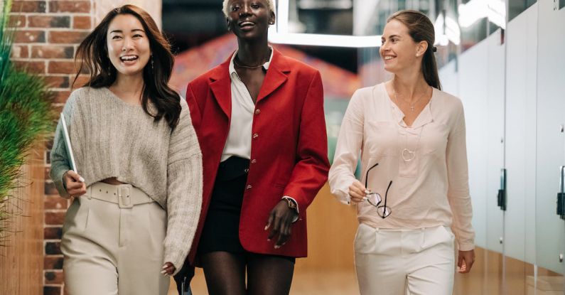 Workspace Organization - Successful multiethnic business colleagues in modern office